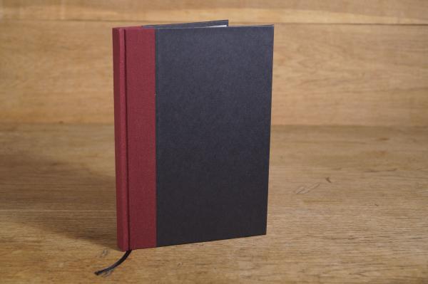 Writing and notebook black, with wine red linen